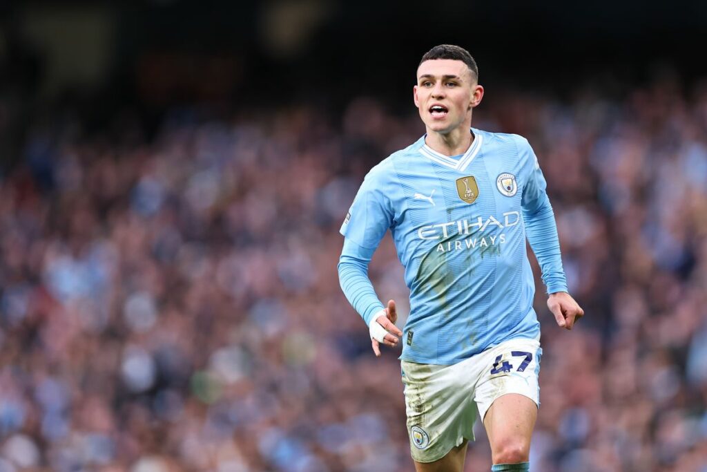 Award-winner Phil Foden helps Man City equal United record