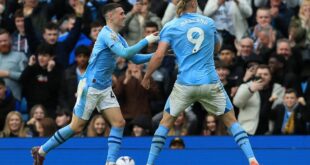 Haaland nets four as Man City keep pace in title race