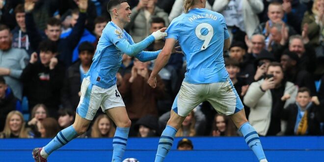 Haaland nets four as Man City keep pace in title race