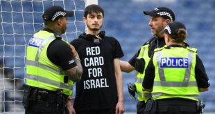 Protester in “Red Card For Israel” shirt disrupts Scotland game