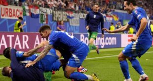 Italy wins knockout berth with 1-1 draw over Croatia