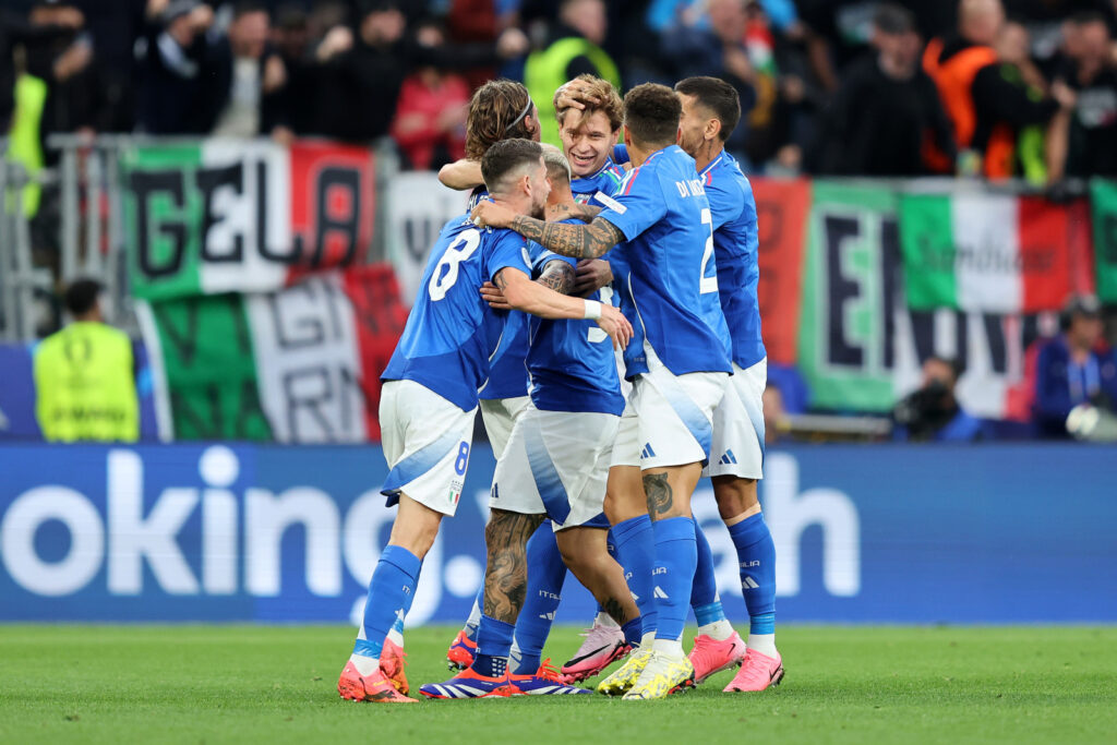 Italy overcome fast starting Albania to open title defence