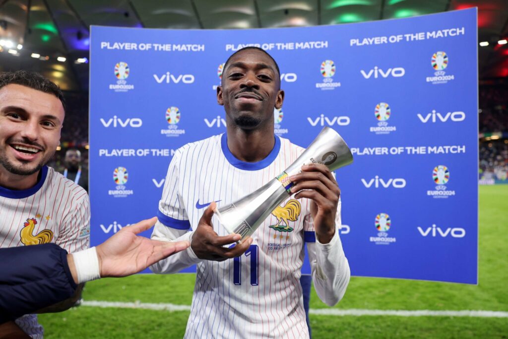 France players hype up Dembele as he receives Man of the Match award