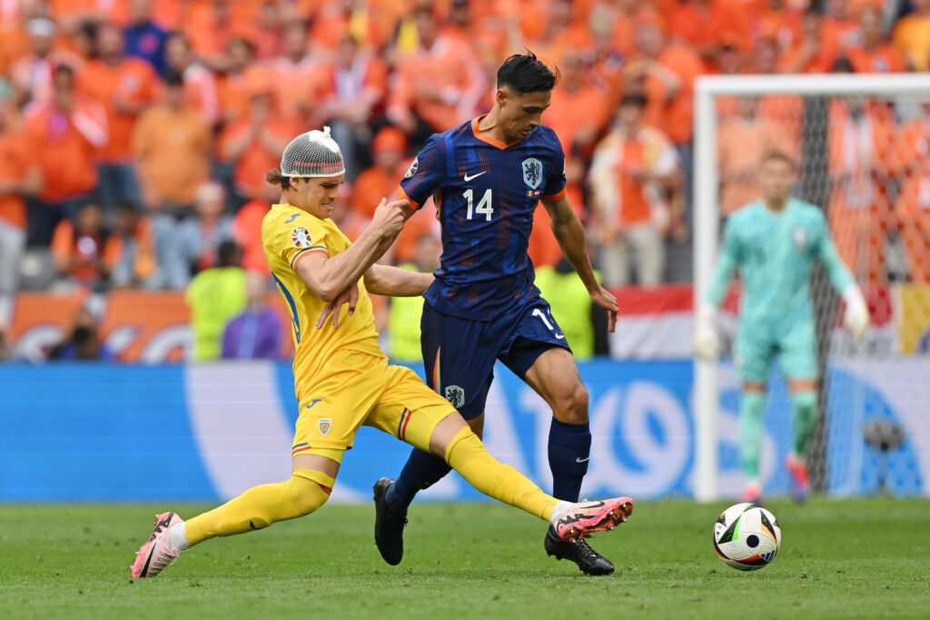 The Dutch brush Romania aside 3-0 head for Berlin