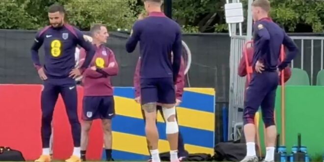 John Stones spotted training in knee strapping