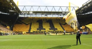 Yellow Wall turns red: Dortmund fans blast arms deal