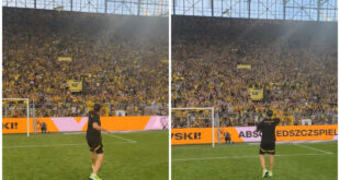 Jurgen Klopp produces fist pumps in front of Dortmund’s Yellow Wall