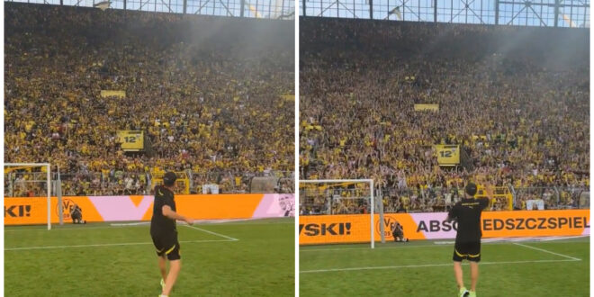 Jurgen Klopp produces fist pumps in front of Dortmund’s Yellow Wall