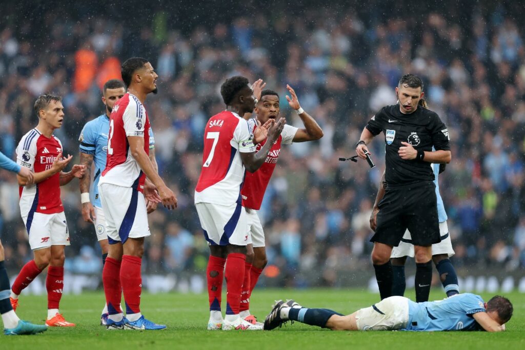 Referee questioned after Manchester City player avoids identical Leandro Trossard booking